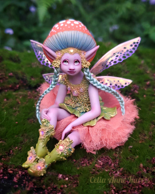 A Purple and Apricot Mushroom Fairy